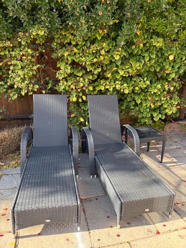 Two black rattan sun - two, loungers
